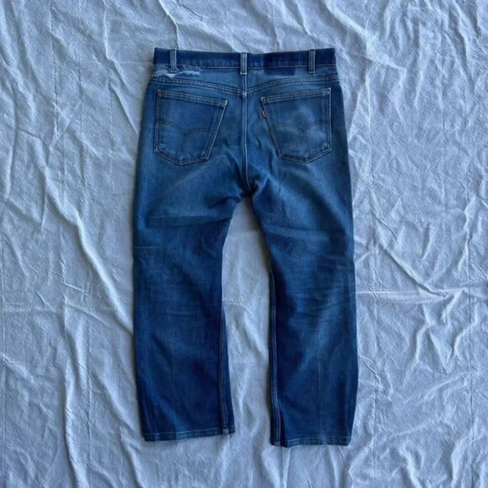 Vintage Distressed orange tab little‎ e Levis pants