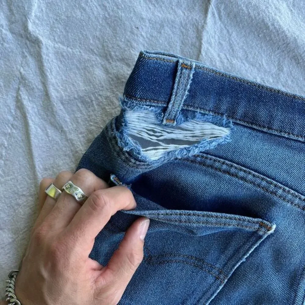 Vintage Distressed orange tab little‎ e Levis pants