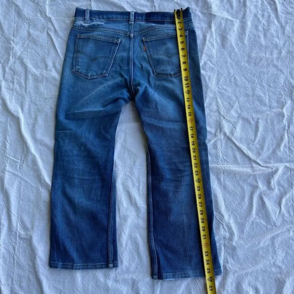 Vintage Distressed orange tab little‎ e Levis pants