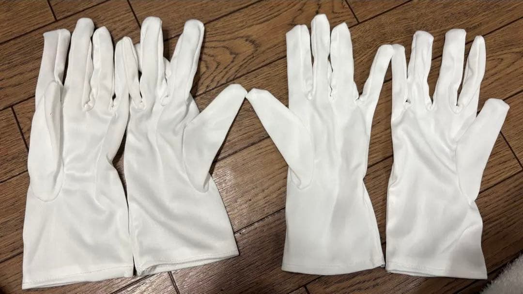 Two pairs of white gloves, formal