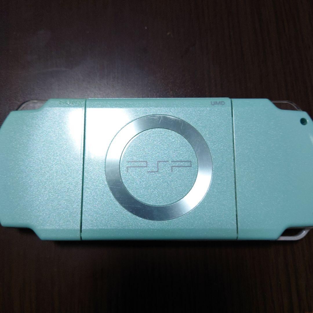 PSP2000 Console (Junk) + AC Adapter + Memory Stick + Game