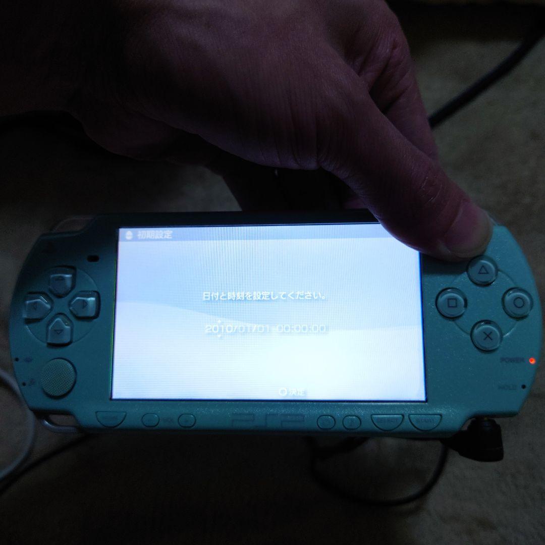 PSP2000 Console (Junk) + AC Adapter + Memory Stick + Game