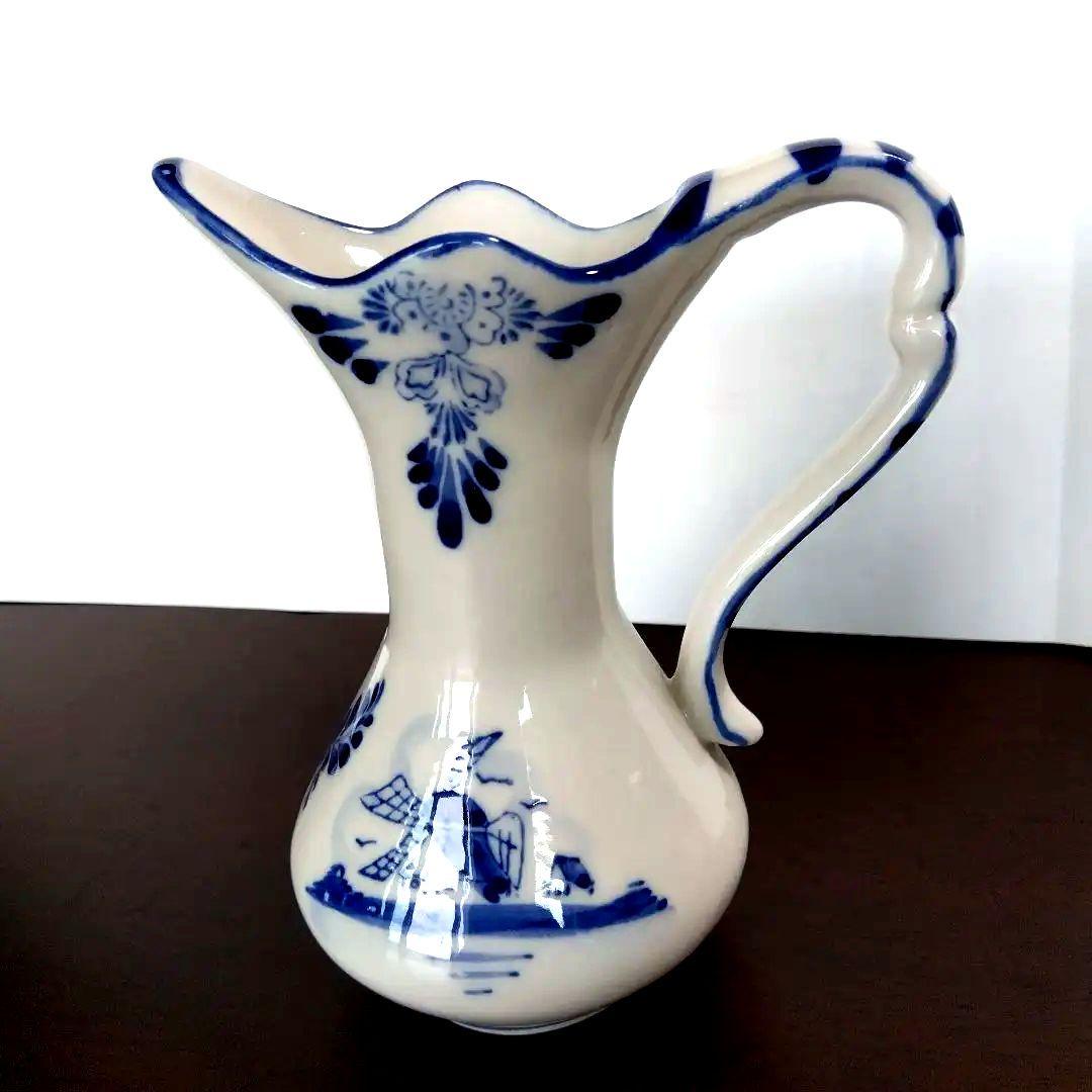 Price reduced. Netherlands Delftware pitcher.